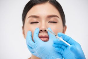 woman-getting-nonsurgical-rhinoplasty