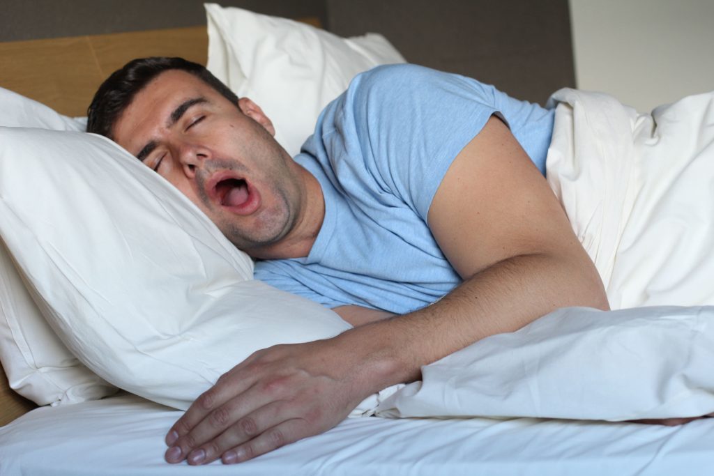 Eating a baguette while sleeping