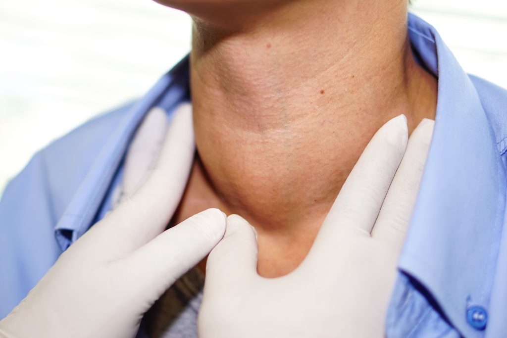 doctor-checking-neck